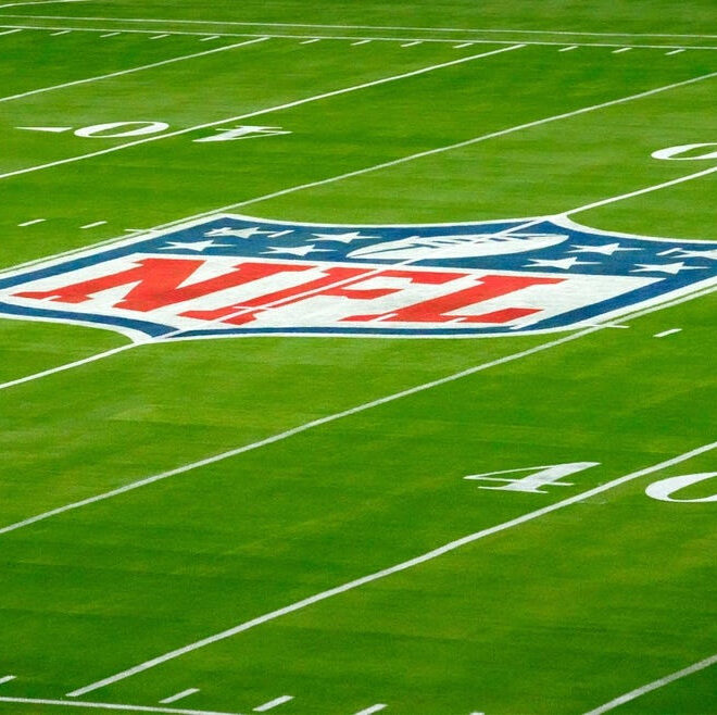 NFL logo on the field at Super Bowl LVII.