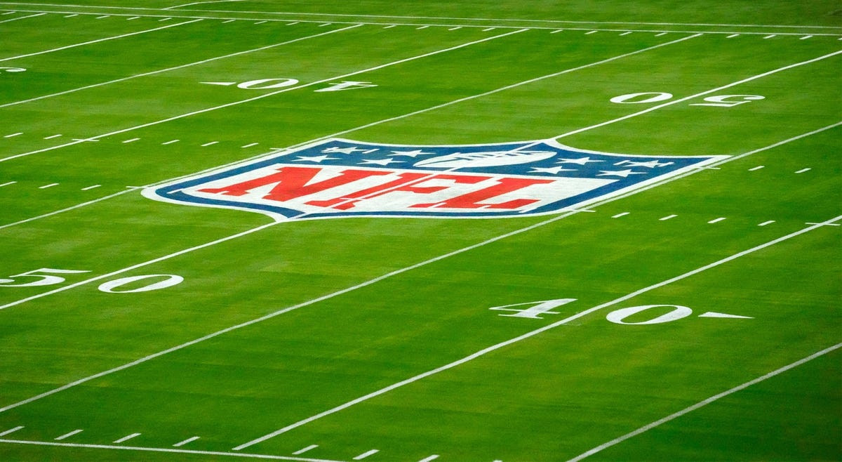 NFL logo on the field at Super Bowl LVII.