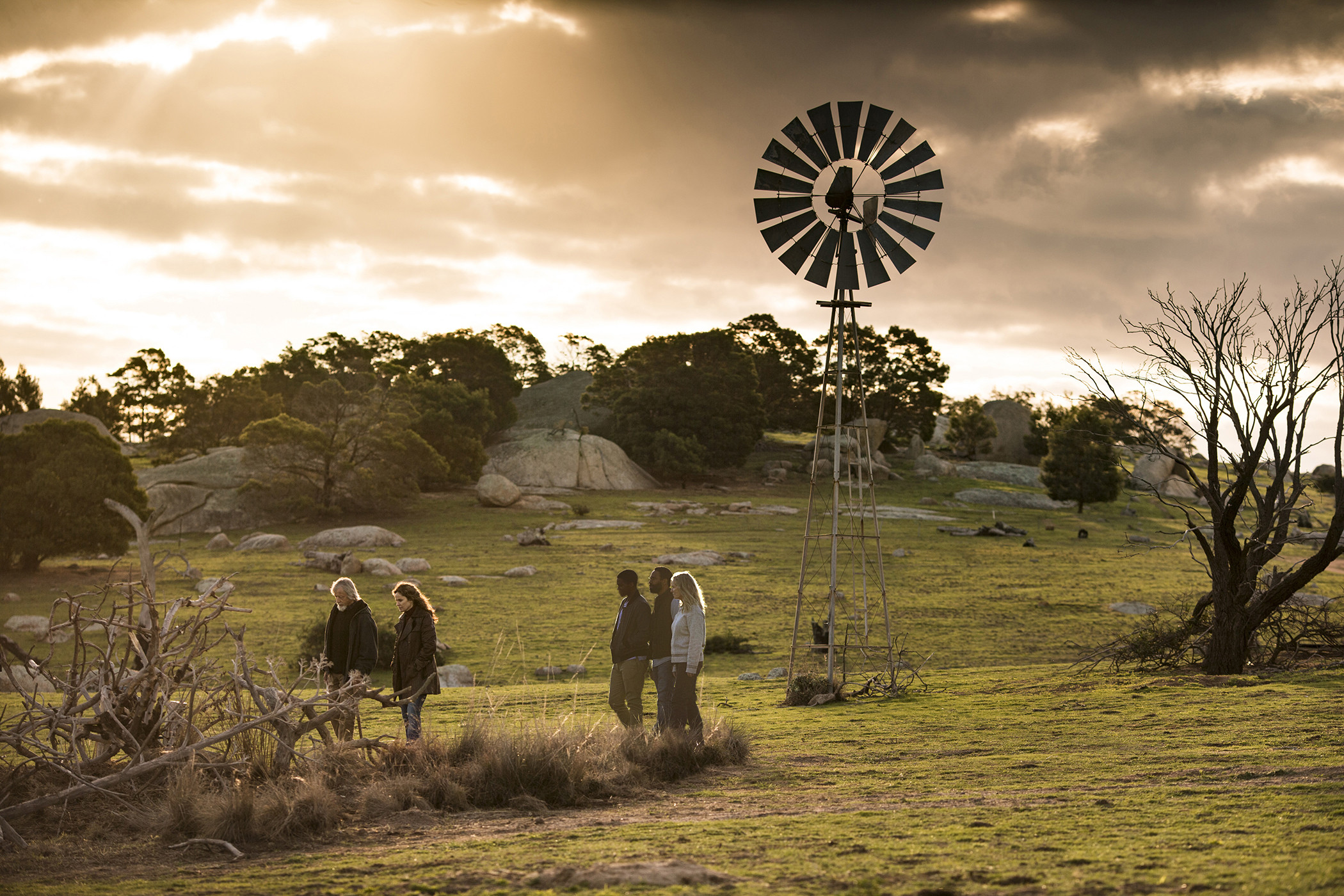 A promotional image for The Leftovers featuring key characters, highlighting the show's exploration of complex relationships and emotional journeys.