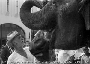 Keenan Wynn and Anna Mae the elephant on the set of Movin' On.