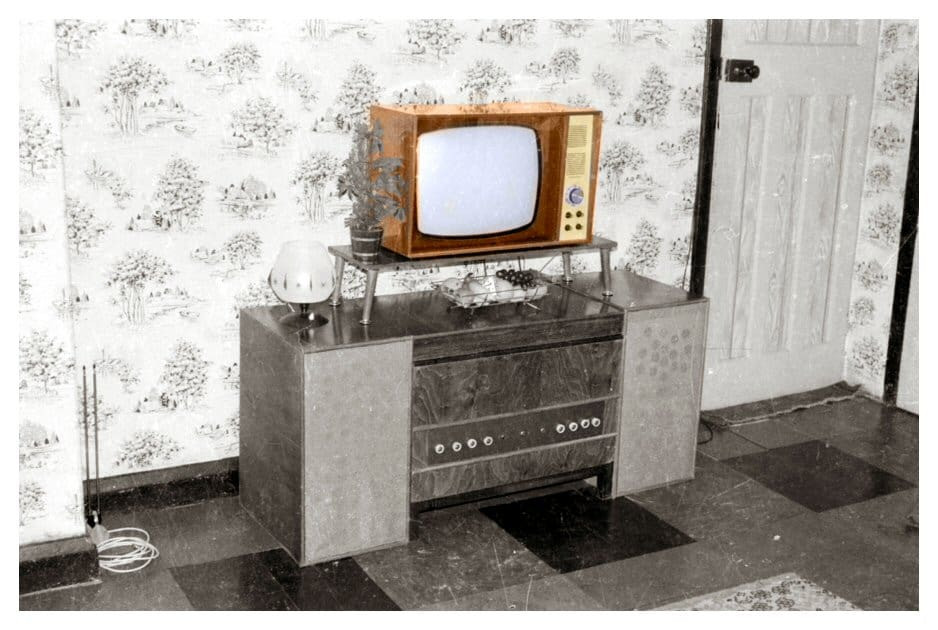 RCA Victor Television Set from the 1950s showcasing its stylish design and wood-grain finish