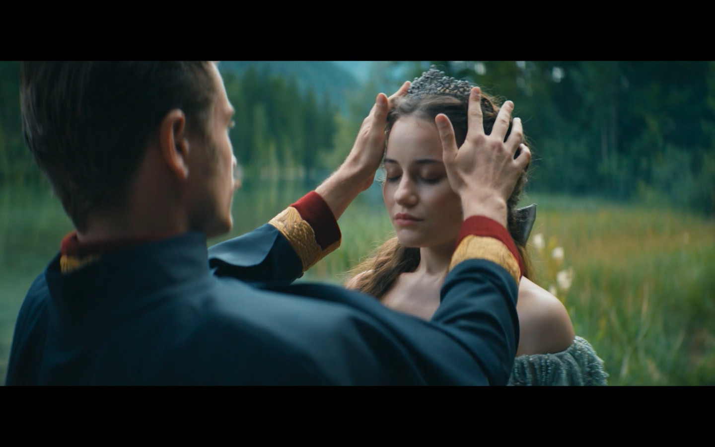 Sisi and Franz Joseph in a scene from the "Sisi" television show, their expressions conveying the complexities of their relationship.