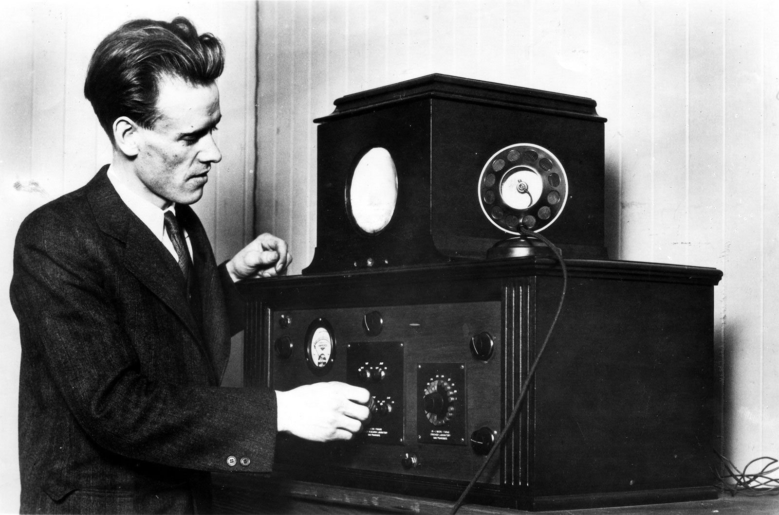 Philo Farnsworth with the television receiver he invented.